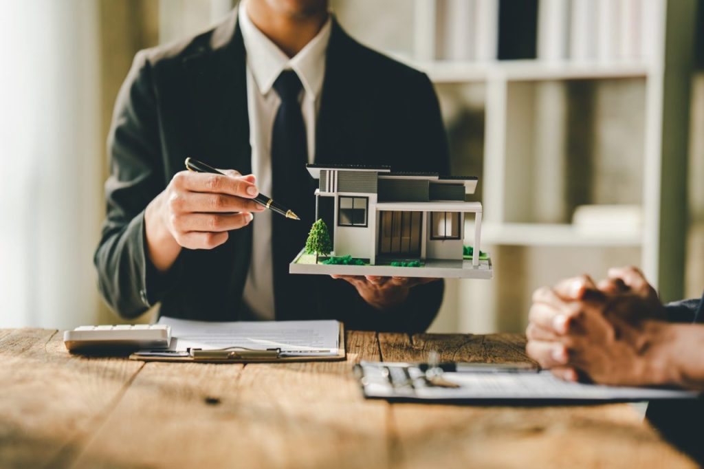 Buying a Home in 2025: How to Navigate High Rates and Market Changes image by The O'Kavage Group Buying a Home in 2025: How to Navigate High Rates and Market Changes real estate agent delivering sample homes to customers mortgage loan contracts make a contract for e1695041729988